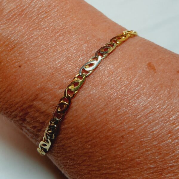 Bracelet maille plate entrelacée or jaune 18 carats